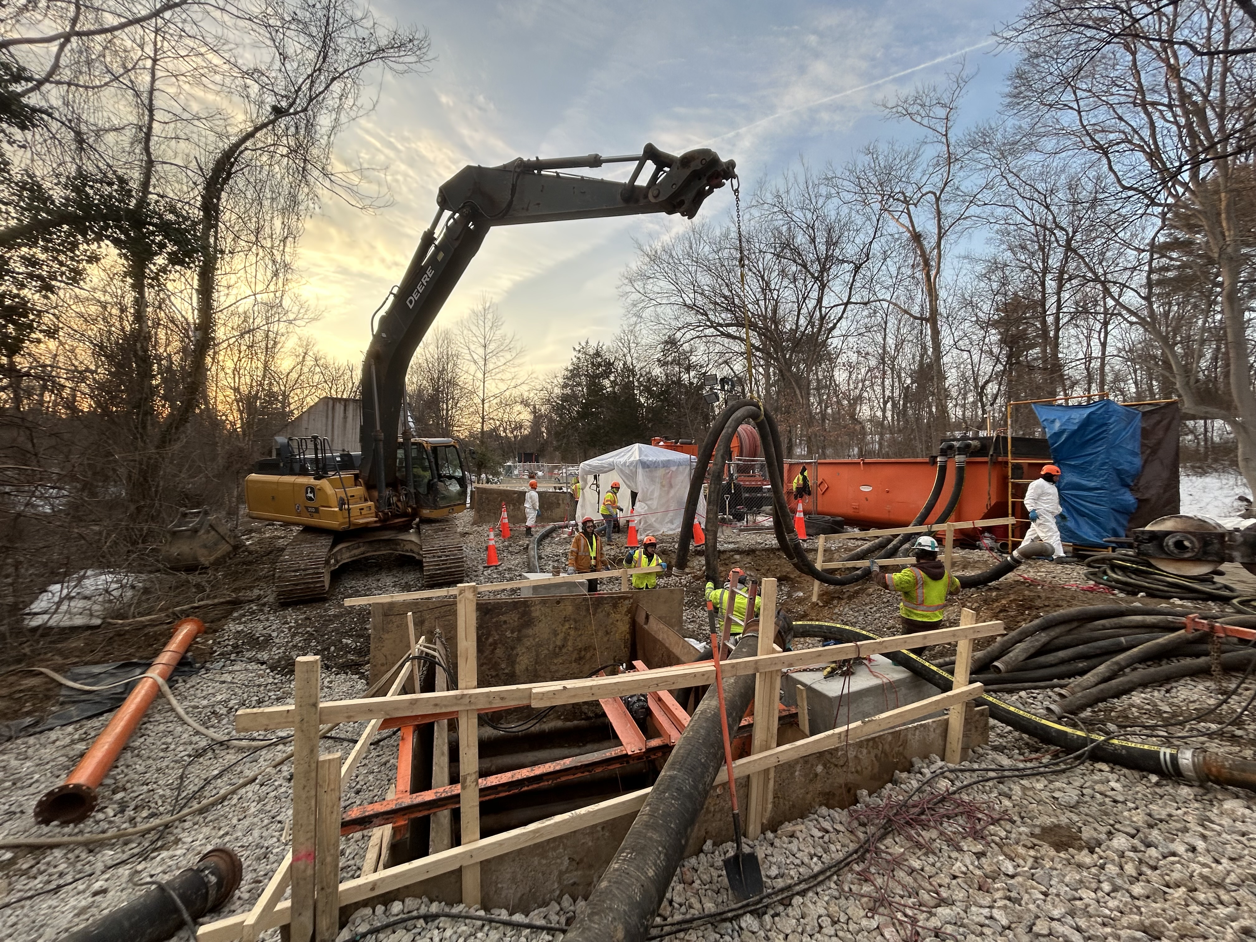 Construction activity at the site of the pipe collapse