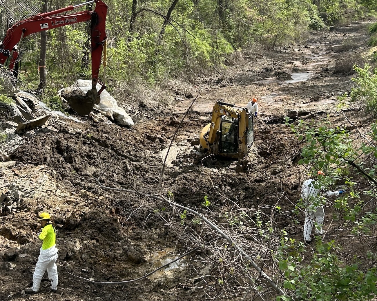 Crews work to remove soil from C&O Canal