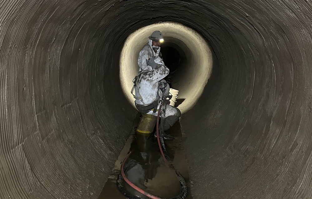 Two workers inside the Potomac Interceptor