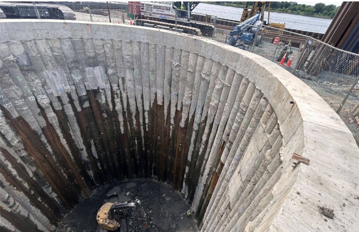 Image: A view of the concrete columns forming a retaining wall for one of the two mining shafts at the West Potomac Park construction site. Similar columns will be installed adjacent to the Capital Crescent Trail.