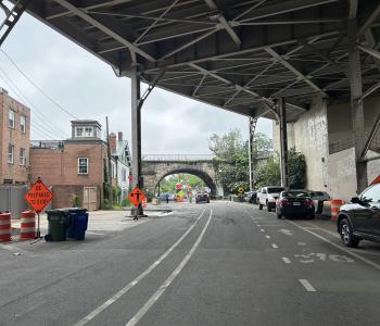 Water Street NW near Capital Crescent Trail. Construction Signs and flaggers.