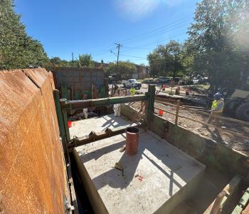 Anacostia Force Main Concrete Pour and Repair Completed Photo of completed repair with concrete encasing the sewr pipe