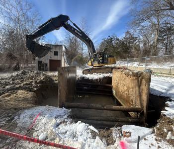 Photo of excavation of collapse site and containment in place