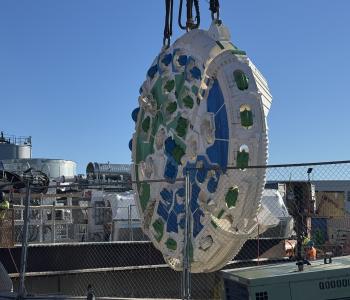TBM Mary's Cutterhead being lowered into the shaft for Potomac River Tunnel