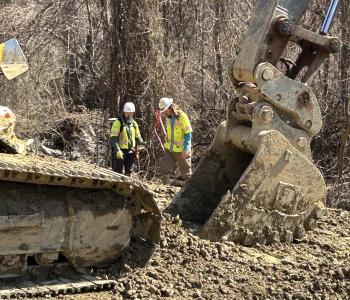 Photo of workers doing environmental rehab site preps