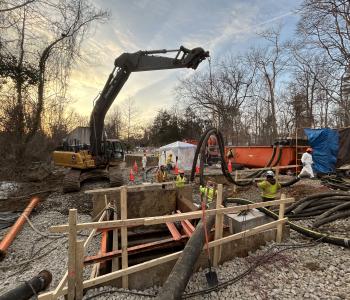 Picture of the work site where cleaning is taking place and pumps being installed