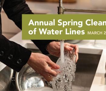 Photo of someone using the tap water with the dates of the annual water line cleaning March 23 - May 4