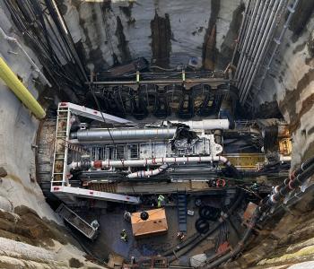 View of Mary at bottom of shaft inside tunnel shown from above