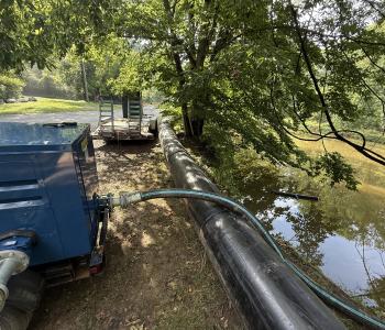 Pennyfield Lock Potomac Interceptor bypass pipeline running next to C & O Canal with equipment