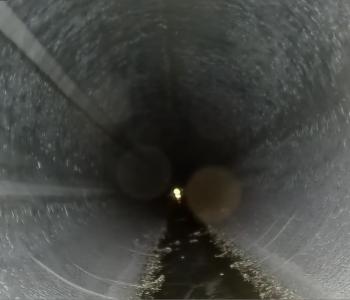 Photo of inside Potomac Interceptor at Dulles showing newly lined tunnel 