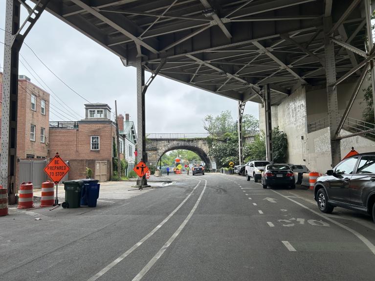 Water Street NW near Capital Crescent Trail. Construction Signs and flaggers.