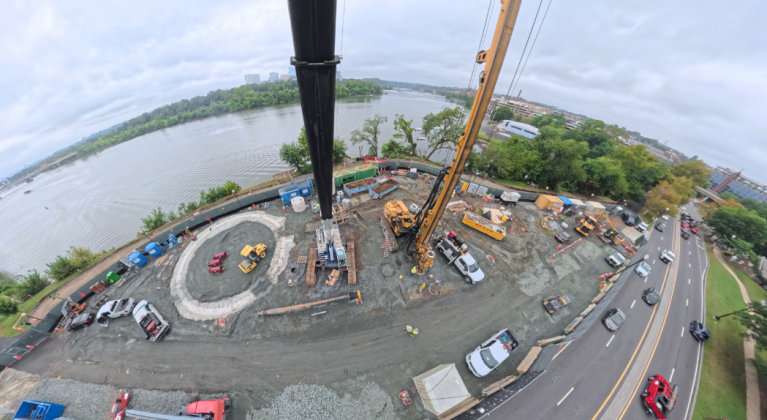 Aerial View of Construction near Watergate Complex Shows cranes and construction of drop shaft underway