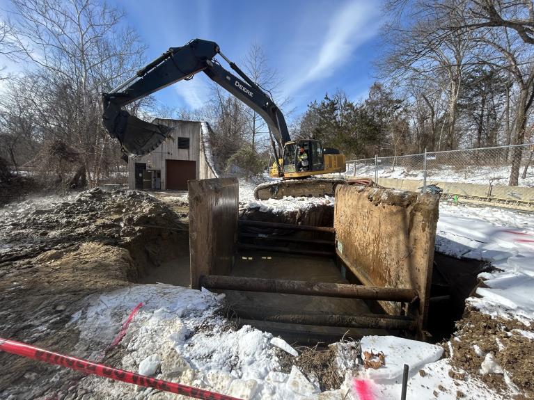 Photo of excavation of collapse site and containment in place
