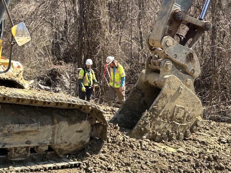 Photo of workers doing environmental rehab site preps