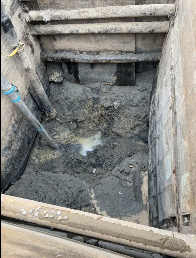 Image of the collapse site drained of water