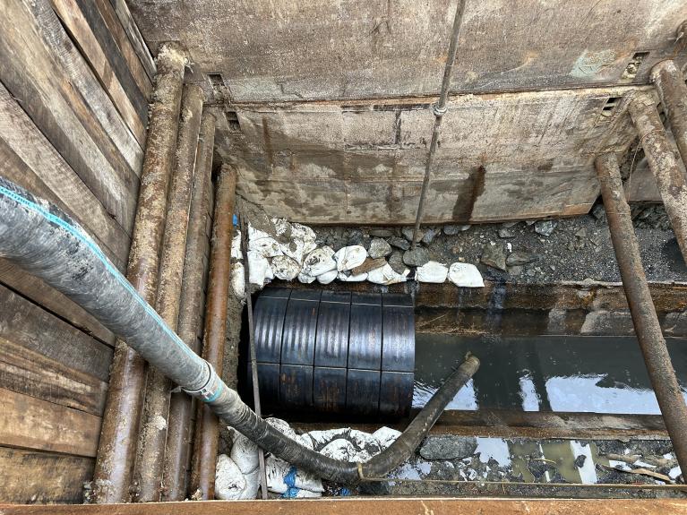 Protective Encasement for workers to apply the geopolymer lining