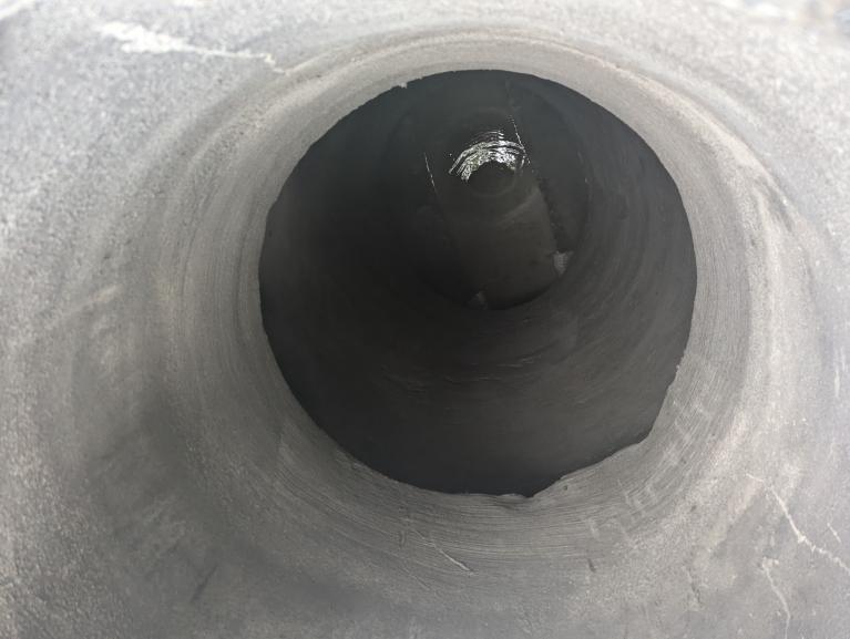 Photo of manhole entrance withe completed geopolymer