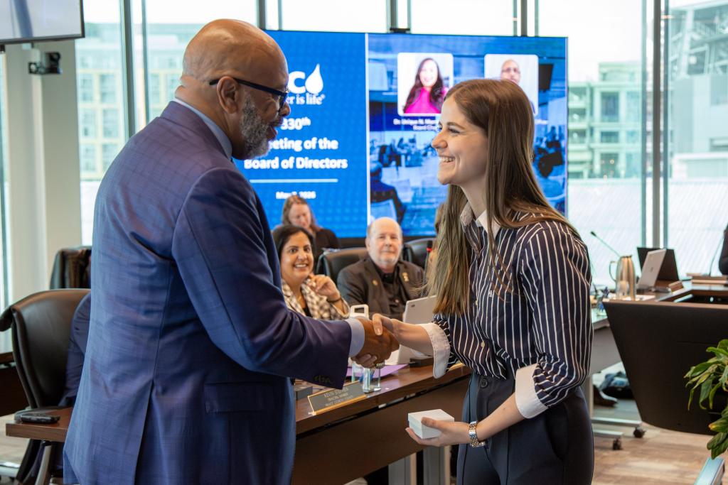 DC Water General Manager and CEO David Gadis recognizes Lily MacDonald during the May Board of Directors meeting.