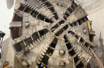 View the tunnel boring machine cutterhead. Image of the tunnel boring machine cutterhead.