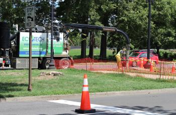 Hydro excavating utilities with a vac truck.