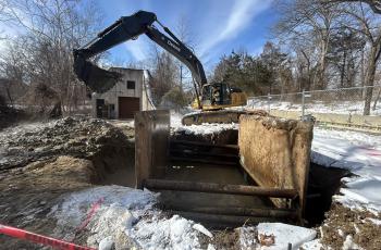 Photo of excavation of collapse site and containment in place