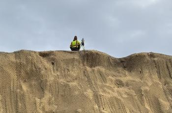 Picture of survey worker at the top of the hill off Canal Road
