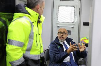 DC Water CEO David Gadis talks to Chief Operating Officer Matt Brown on site.