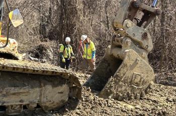 Photo of workers doing environmental rehab site preps