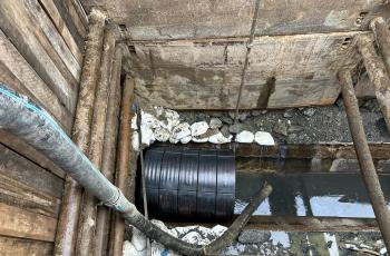 Protective Encasement for workers to apply the geopolymer lining