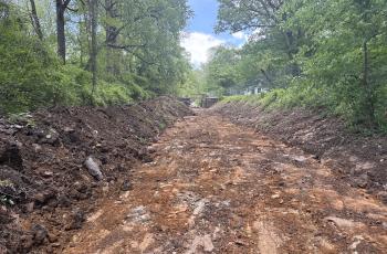 Photo of long stretch of C & O Canal with soil removed
