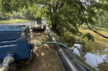 Pennyfield Lock Potomac Interceptor bypass pipeline running next to C & O Canal with equipment