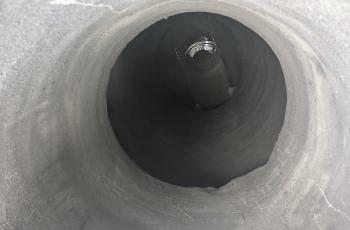 Photo of manhole entrance withe completed geopolymer